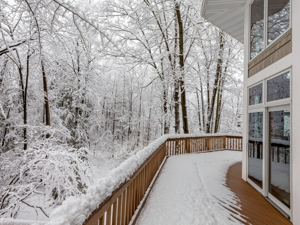 Deck on Home in Snowy Woods in Winter